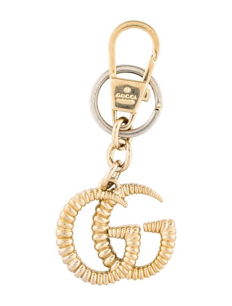 gold gucci keychain|Gucci keychain men.